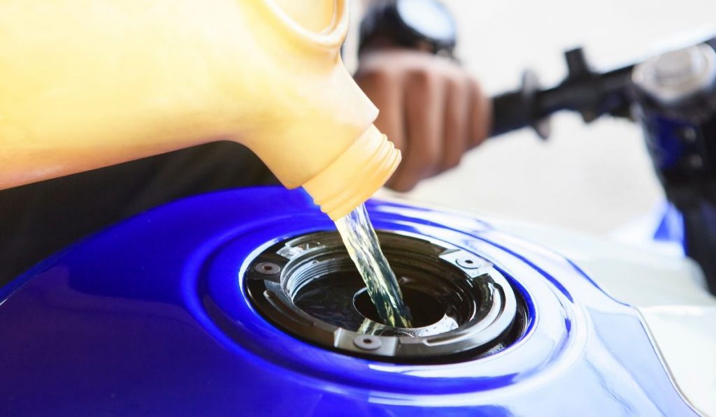 filing up the motorcycle gas tank