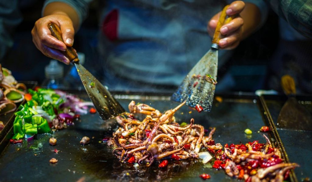 chef cooking live in front of the customers